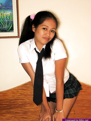 Juvenile looking Oriental schoolgirl sports a creampie after getting team-fucked in socks