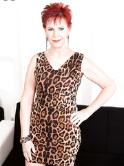 Sexy granny with red hair Caroline Hamsel sucks and licks her sextoy collection