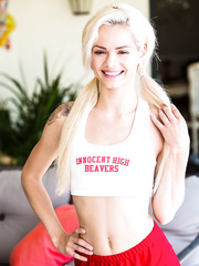 Slender cheerleader legal age teenager Elsa Jean undresses and shows taut slit and miniature scones