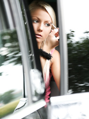 Gorgeous blond legal age teenager Grace puts out her smoke and models nude beside road