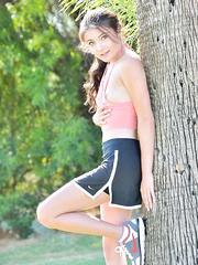 Cute legal age teenager beauty disrobes for bare modelling in public park