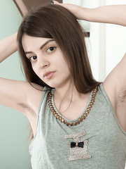 Sinless legal age teenager cutie makes her undressed modeling debut by showing off her hirsute bush