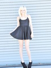 Cute golden-haired dildos her pink cunt after hiking up her dark petticoat in heels