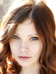 Breathtaking youthful Emanuelle displays her agreeable slit on the steps outdoors