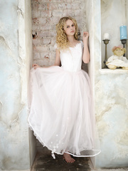 Blond legal age teenager undresses off her bridal gown and cotton pants for undressed positions