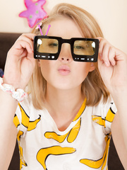 Teenage doll Alisha flaunts her blameless cunt and petite melons in hawt socks