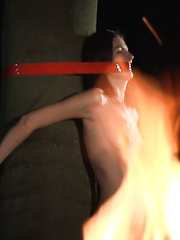 Slender legal age teenager acquires overspread in wax during a S&M session with her handler