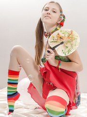 Enjoyable youthful Catalina in pigtails widening wide to exposed her miniature legal age teenager muff