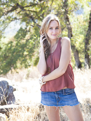 Legal Age Teenager hotty next door Sarah G undresses to pose bare on a blanket in the woods