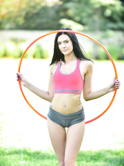 Black haired topless hula hoop cutie toys her constricted beaver with baseball bat