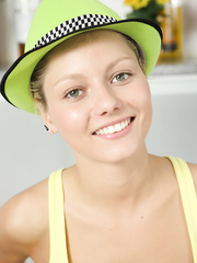 Alluring legal age teenager Pinky June disrobes to bumble bee knee socks previous to masturbating