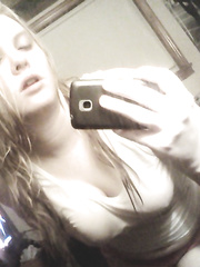 Caitie posing in wet tank-top self shot pictures
