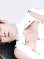 Golden-Haired nurse toys a straightjacketed female patient's dark hole