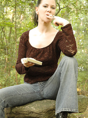 Brunette Hair sweetheart bares her titties whilst smokin' in the woods