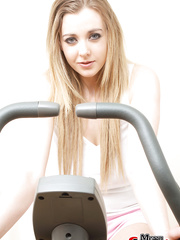 Sports beauty Sapphire Blue undressing to exercise with bouncy large love melons bared