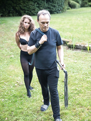 Female sex villein is restrained by her Slaver previous to being flogged and drilled