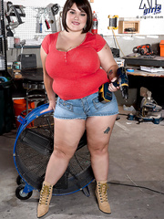 big beautiful woman Lisa Canon whips out her giant tits in her dude's tool shop
