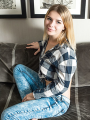 Enjoyable legal age teenager with blond hair Yelena doffs jeans on her way to posing nude