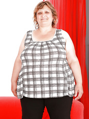 Wicked older plumper stripping off her raiment and exposing her curly vag