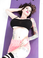 Pierced and tattooed Ariane Saint-Amour models her astounding biggest beasts