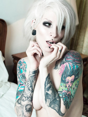 Slim beauty with tattoo sleeves Razor Candi models stripped in striped knee socks