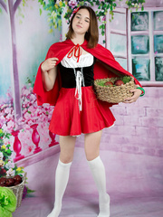 Cosplay angel Slava slips out of her dress to widen her legs wide in socks