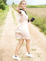 Juvenile golden-haired Yelena receives completely exposed in a farmer's field
