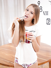 Enchanting and virginal legal age teenager Nika O plunges her fingers into shaved cunt