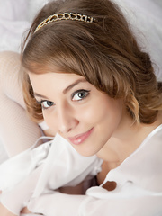 Pleasant legal age teenager cutie has the look of an girl whilst posing in just white stockings