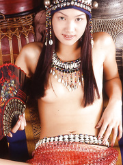 Ideal Thai sweetheart masturbates her curly swollen twat and caresses breasts