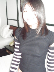 Juvenile oriental beauty exposing her small love muffins and trimmed soaked fur pie