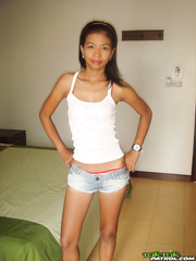 Thai angel Kwan does an incredible striptease performance for the camera