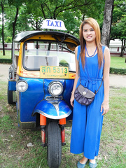 Thai beauty Mon flirting with a cute male tourist in public