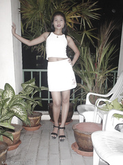 Lengthy haired oriental honey exposing her diminutive love bubbles and widening her legs