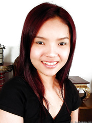 Tempting oriental chick exposing her fuckable body and toying her unshaved slit