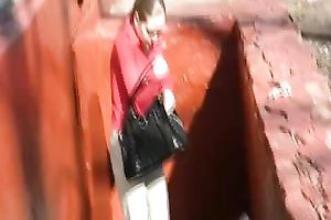 Russian white lady Olga in the park urinates in her white panties