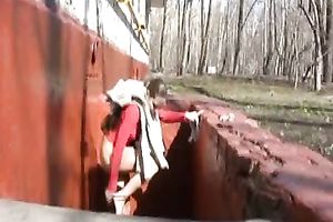 Russian white lady Olga in the park urinates in her white panties