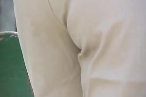Russian white lady Olga in the park urinates in her white panties