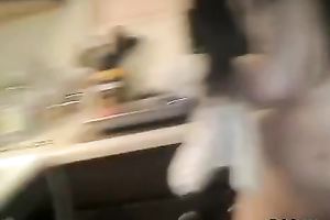 Pretty dark brown jumps on a realistic sex tool in homemade solo video