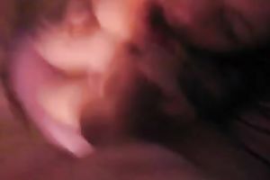 Dark-haired milf sucks 2 weiners and receives facialed