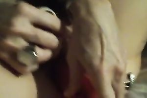 Mature whore with a bushy fur pie is fucking herself with her favourite sex tool