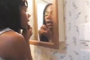 This sassy lalin girl loves to go wild in front of the mirror