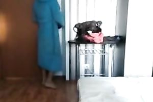 Webcam clip with a dark brown playgirl engulfing her lover's cock