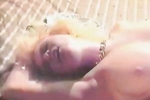 Outdoor retro episode with honeys eating twats on a beach