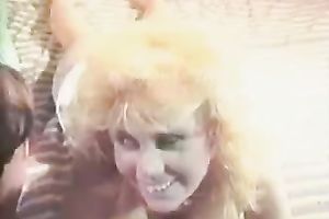 Outdoor retro episode with honeys eating twats on a beach