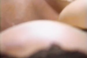 Retro dark brown mama receives her bald vag licked to big O