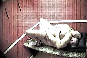 A security webcam movie scene of a sexy brunette hair masseuse riding a shlong