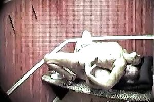 A security webcam movie scene of a sexy brunette hair masseuse riding a shlong