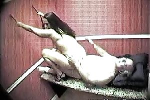 A security webcam movie scene of a sexy brunette hair masseuse riding a shlong