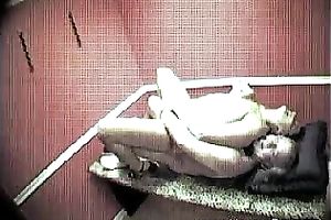 A security webcam movie scene of a sexy brunette hair masseuse riding a shlong